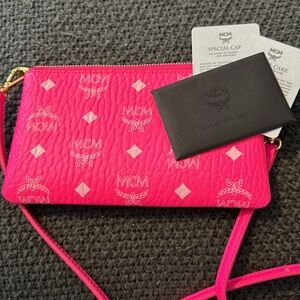 MCM Neon pink crossbody/belt bag.  Never worn.  With care cards!